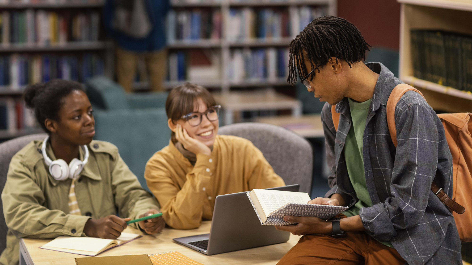 colleagues studying university library